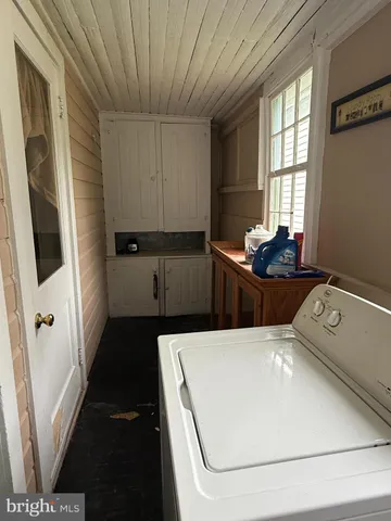 a kitchen with stainless steel appliances a refrigerator and a stove