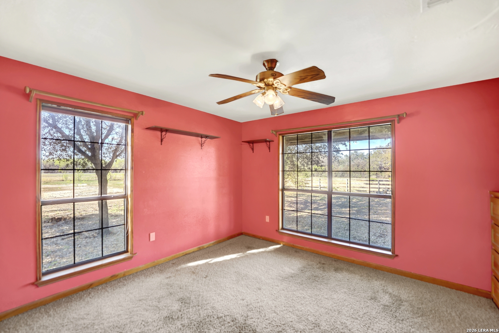 386 County Road 763 Devine, TX 78016 - Photo 42 of 49 a view of an empty room with a window