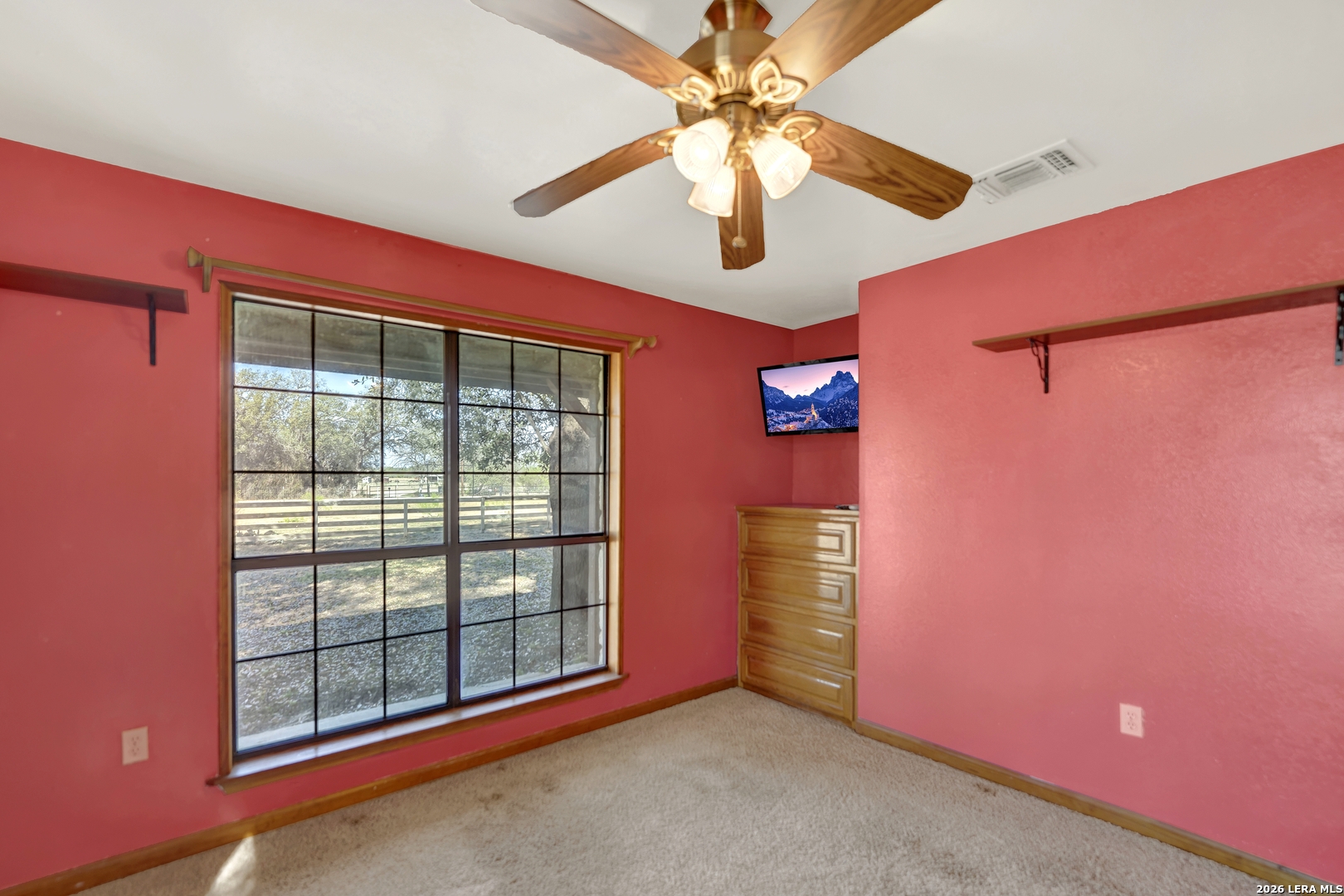 386 County Road 763 Devine, TX 78016 - Photo 43 of 49 a view of an empty room with a window