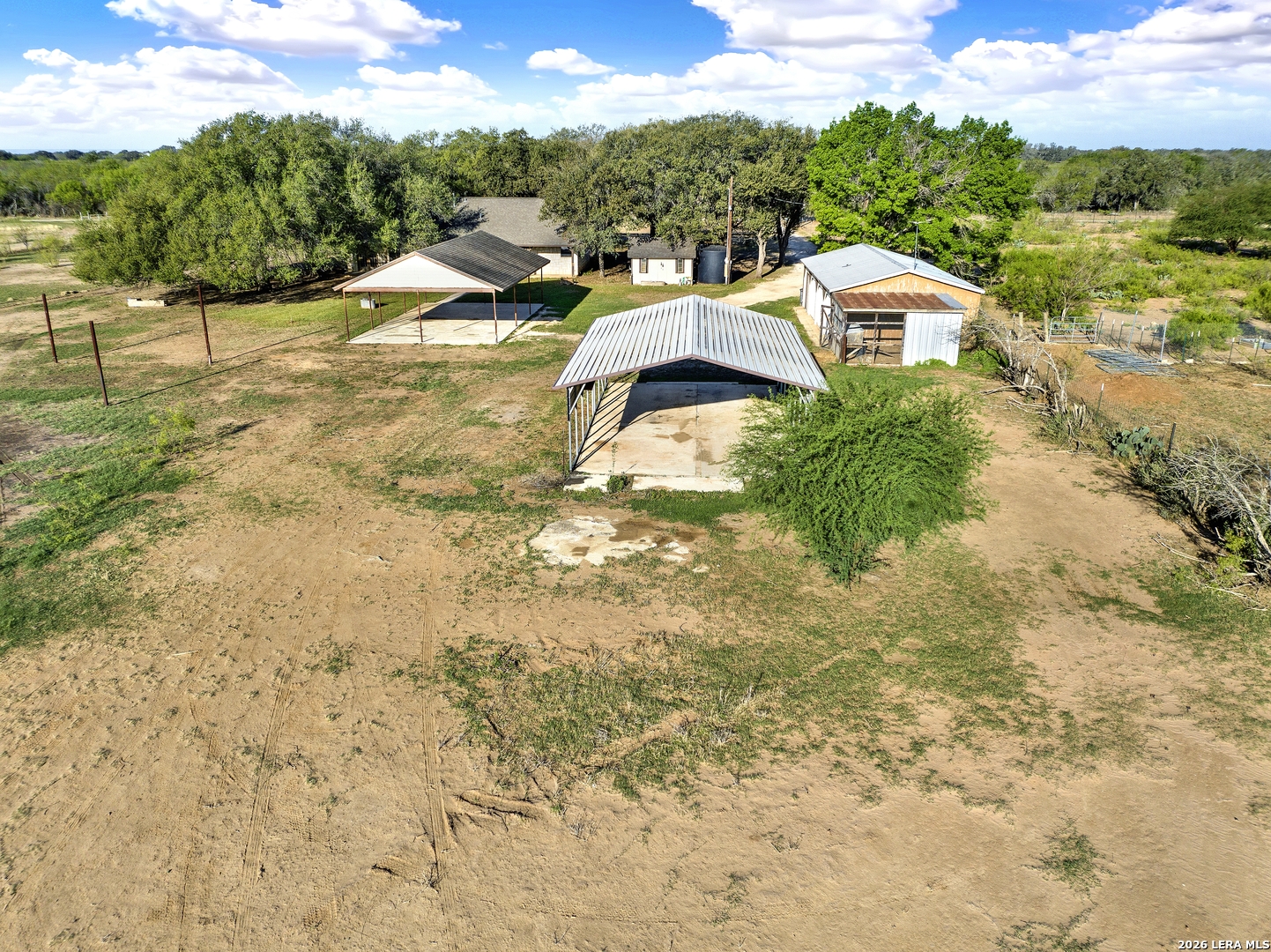 386 County Road 763 Devine, TX 78016 - Photo 6 of 49 a view of residential houses with yard
