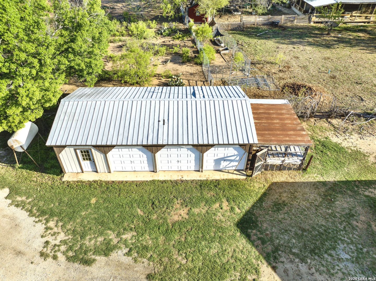 386 County Road 763 Devine, TX 78016 - Photo 8 of 49 a view of a yard with an outdoor space