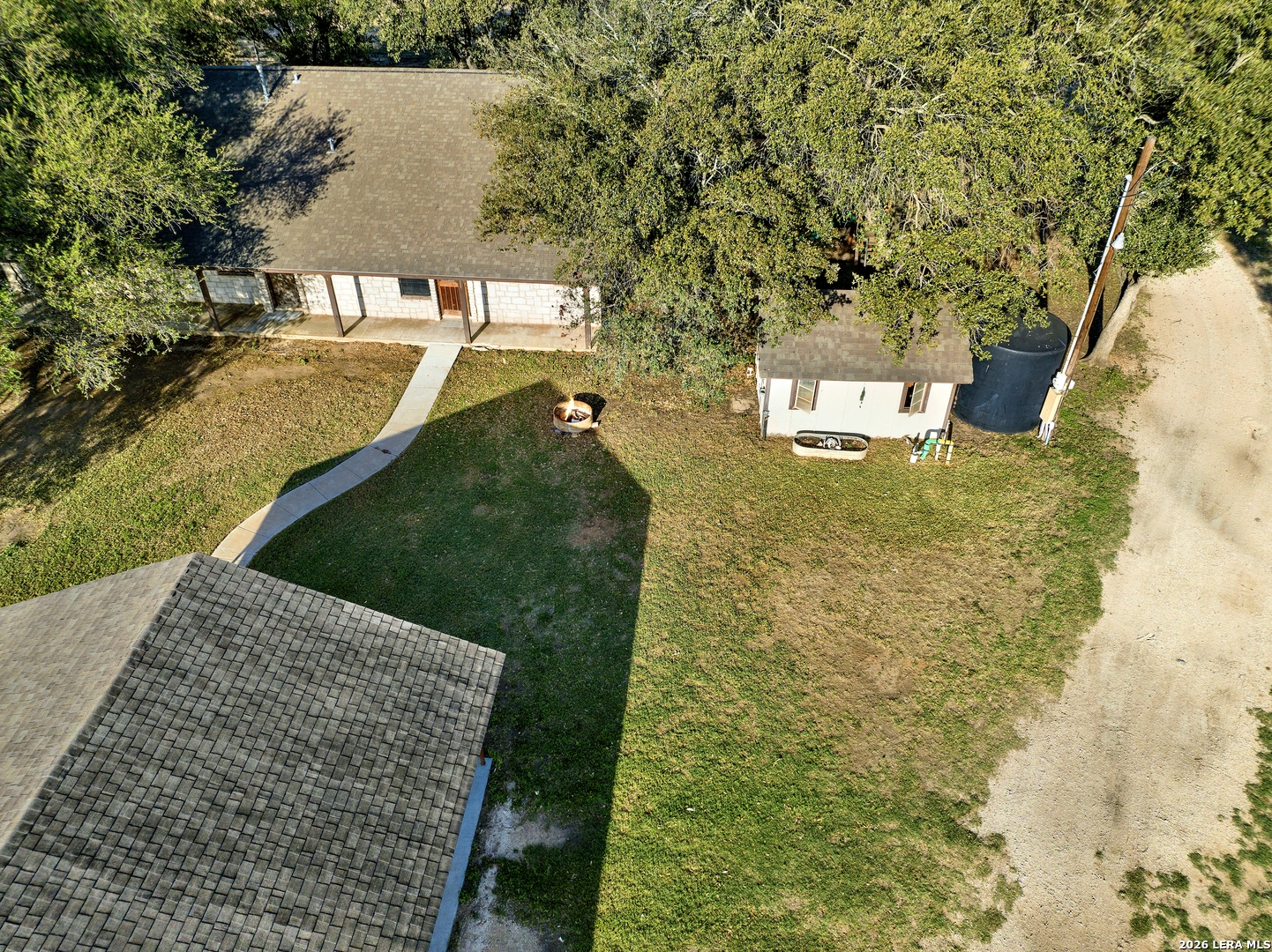 386 County Road 763 Devine, TX 78016 - Photo 9 of 49 a view of a yard with plants