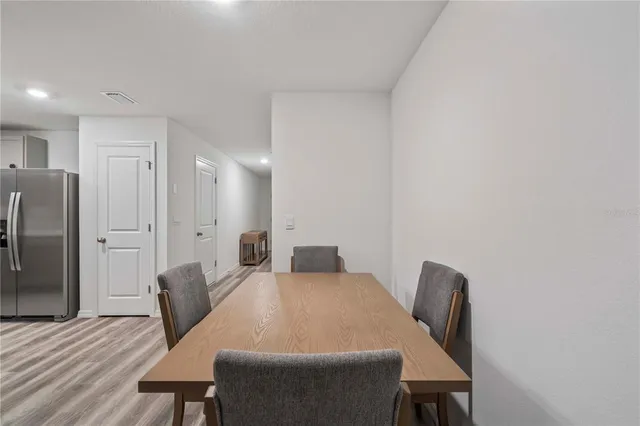 a view of a dining room with furniture