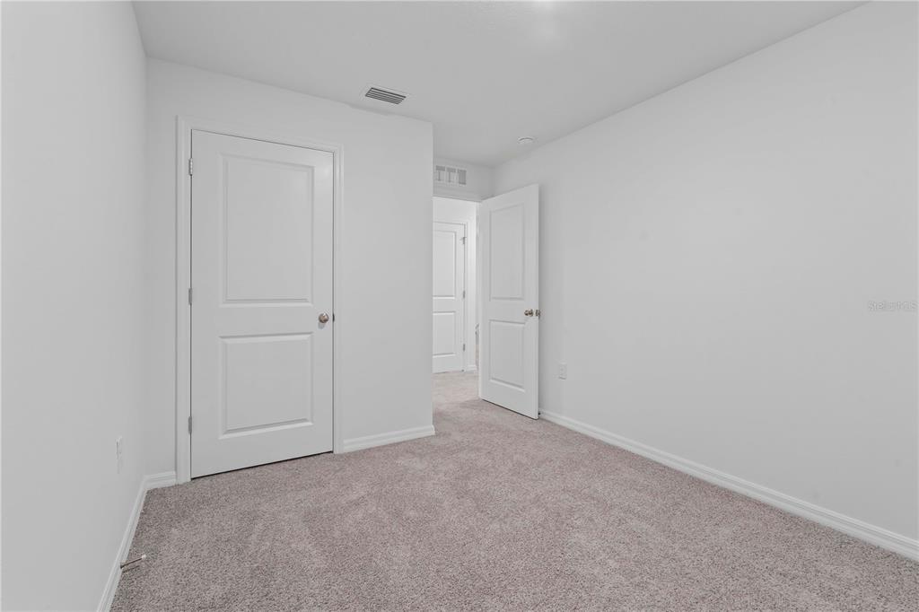 959 Spotted Egret Loop Ruskin, FL 33570 - Photo 32 of 36 a view of an empty room