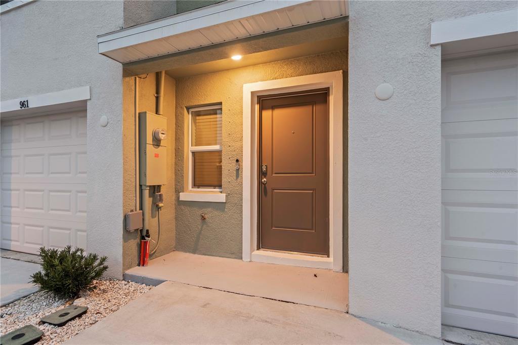 959 Spotted Egret Loop Ruskin, FL 33570 - Photo 6 of 36 a view of front door