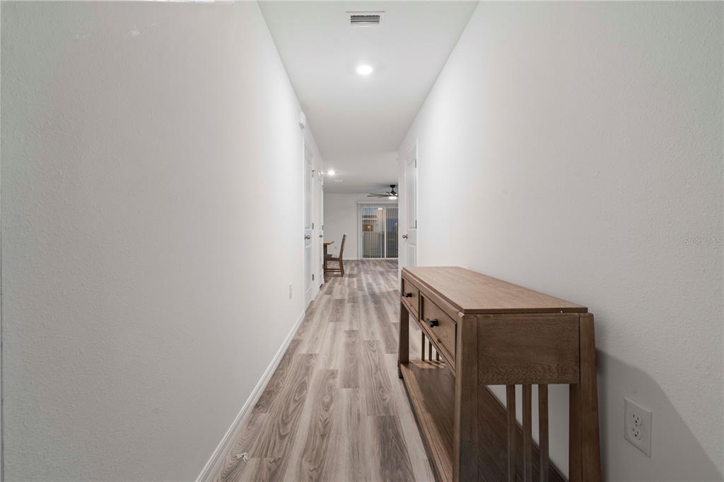 959 Spotted Egret Loop Ruskin, FL 33570 - Photo 7 of 36 a view of a hallway