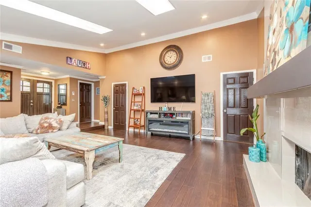 a kitchen with a refrigerator and cabinets