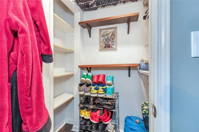 a view of a chairs and table in the balcony