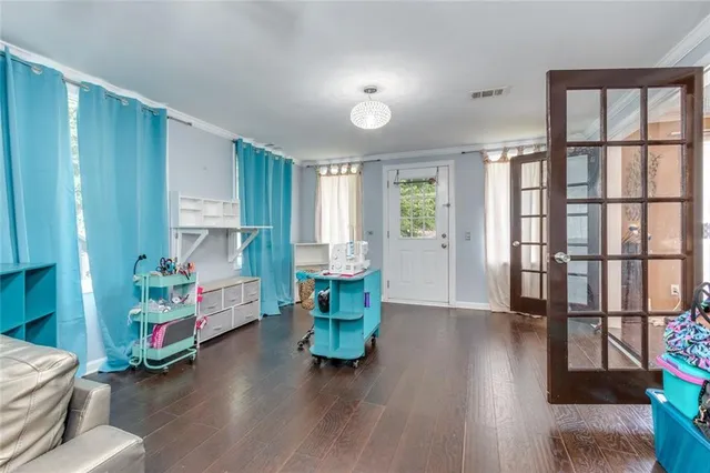 a view of a chairs and table on the deck