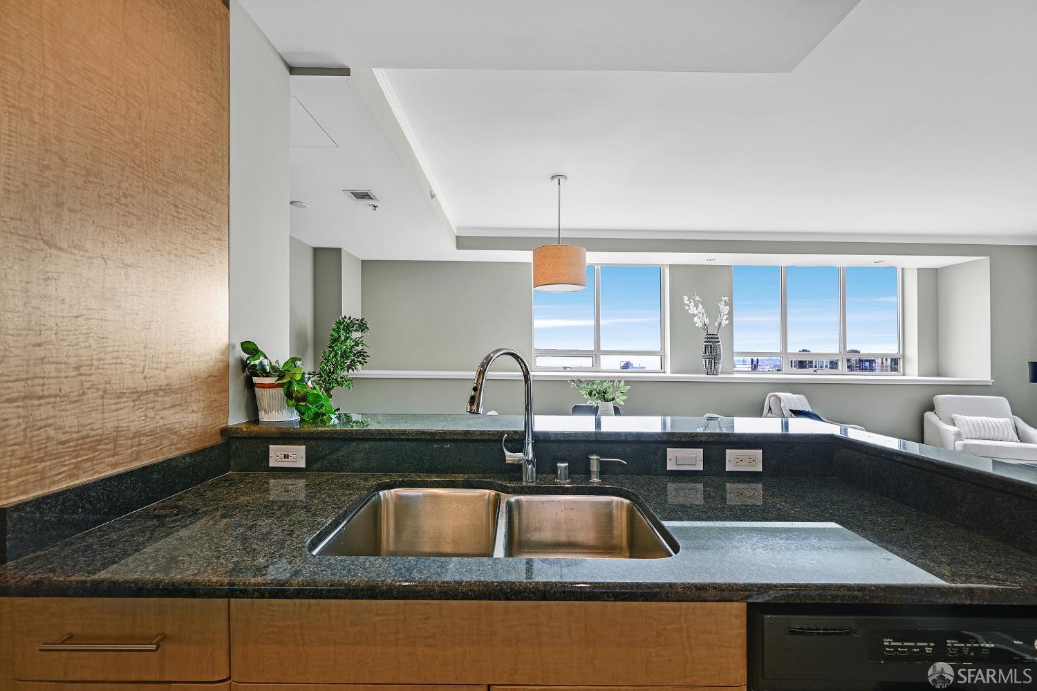 400 Beale Street, Unit 2006 San Francisco, CA 94105 - Photo 15 of 40 a kitchen with a sink and a counter top space