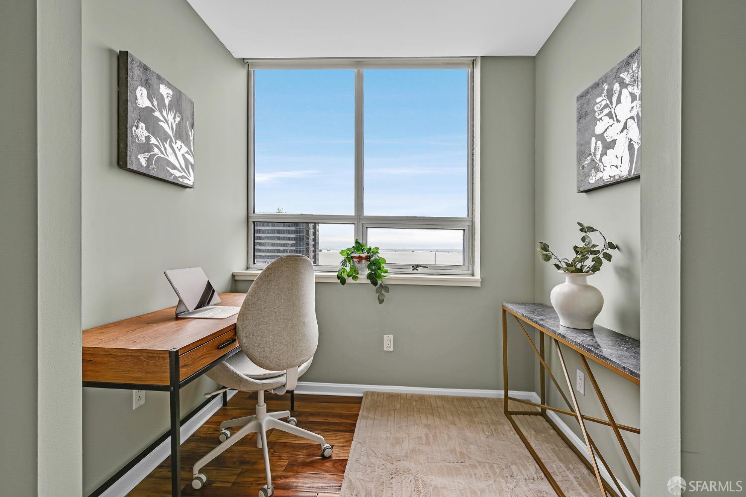 400 Beale Street, Unit 2006 San Francisco, CA 94105 - Photo 18 of 40 a workspace with furniture and a window