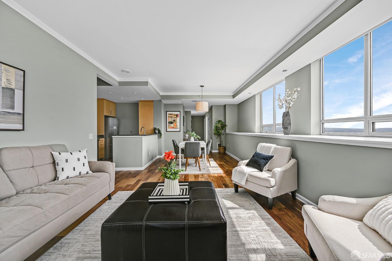 400 Beale Street, Unit 2006 San Francisco, CA 94105 - Photo 2 of 40 a living room with furniture fireplace and a large window
