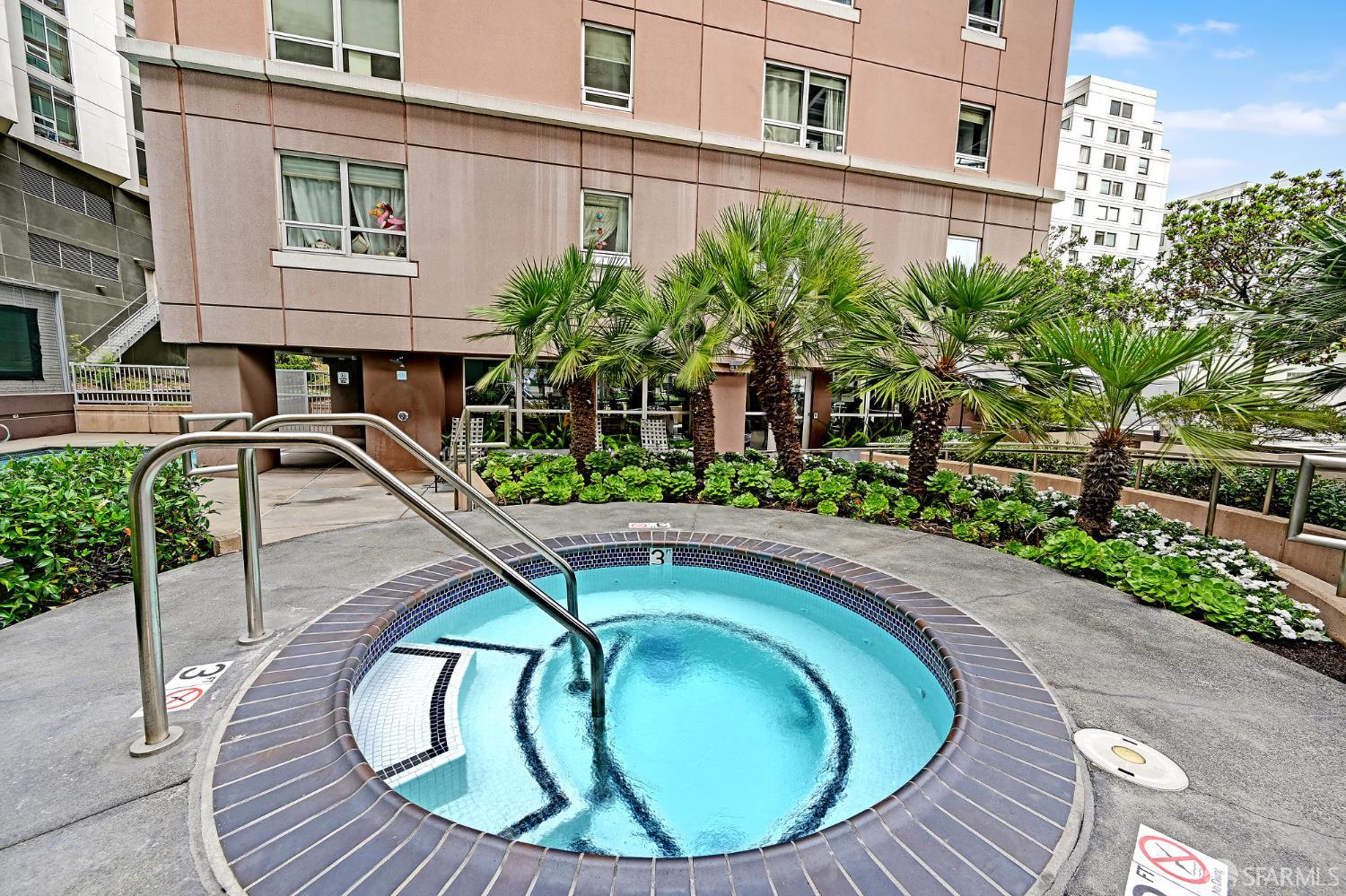 400 Beale Street, Unit 2006 San Francisco, CA 94105 - Photo 33 of 40 a view of a swimming pool with outdoor seating