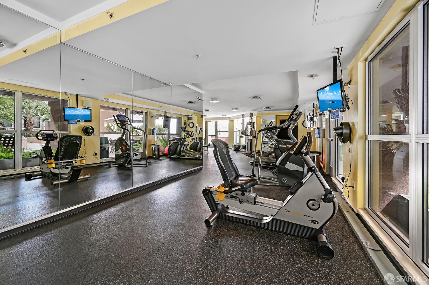 400 Beale Street, Unit 2006 San Francisco, CA 94105 - Photo 37 of 40 a view of a room with gym equipment