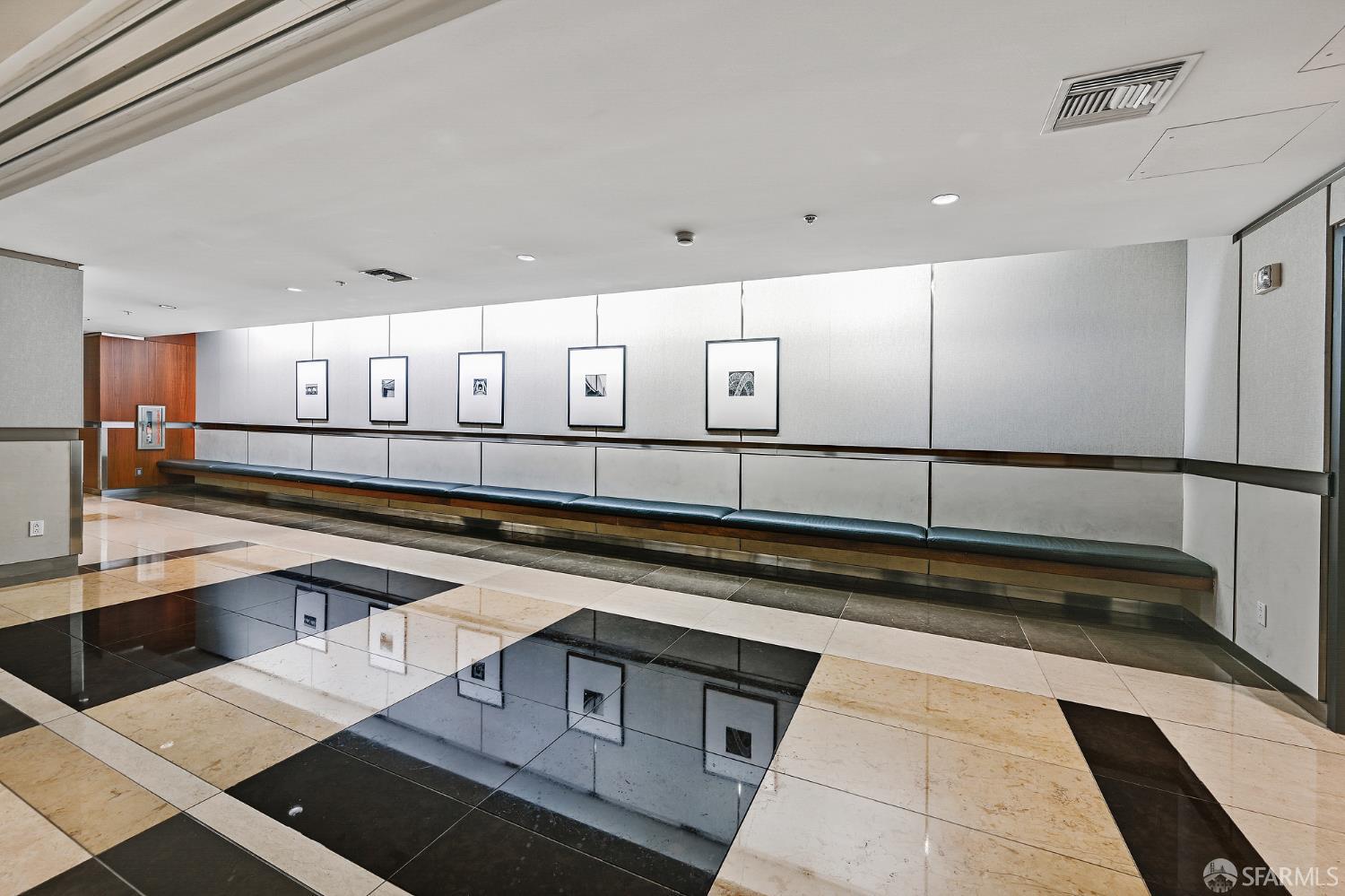 400 Beale Street, Unit 2006 San Francisco, CA 94105 - Photo 38 of 40 a kitchen with stainless steel appliances granite countertop a sink and cabinets