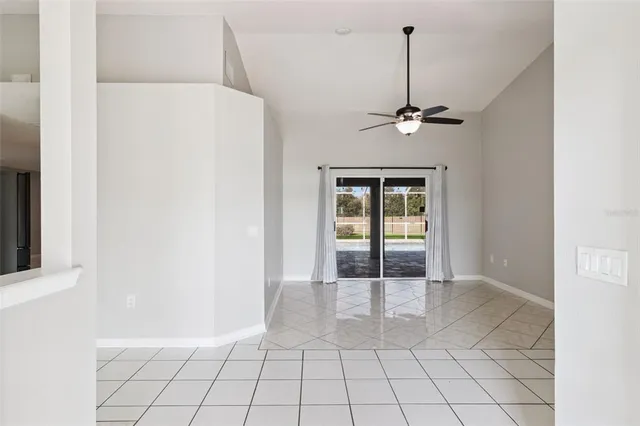 a bathroom with a sink a mirror a vanity and a shower