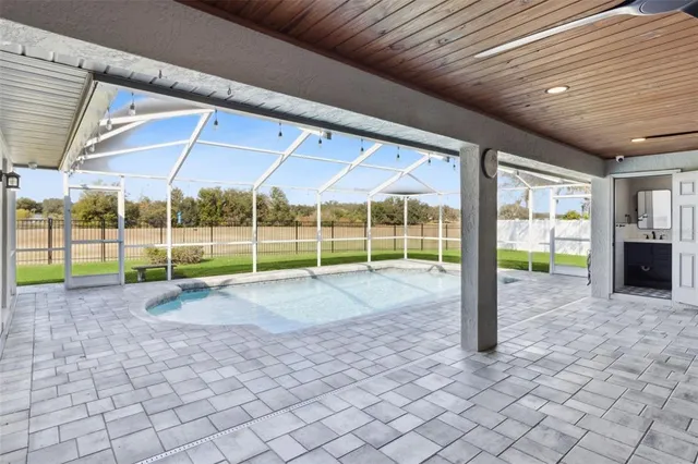 a view of gallery with wooden floor