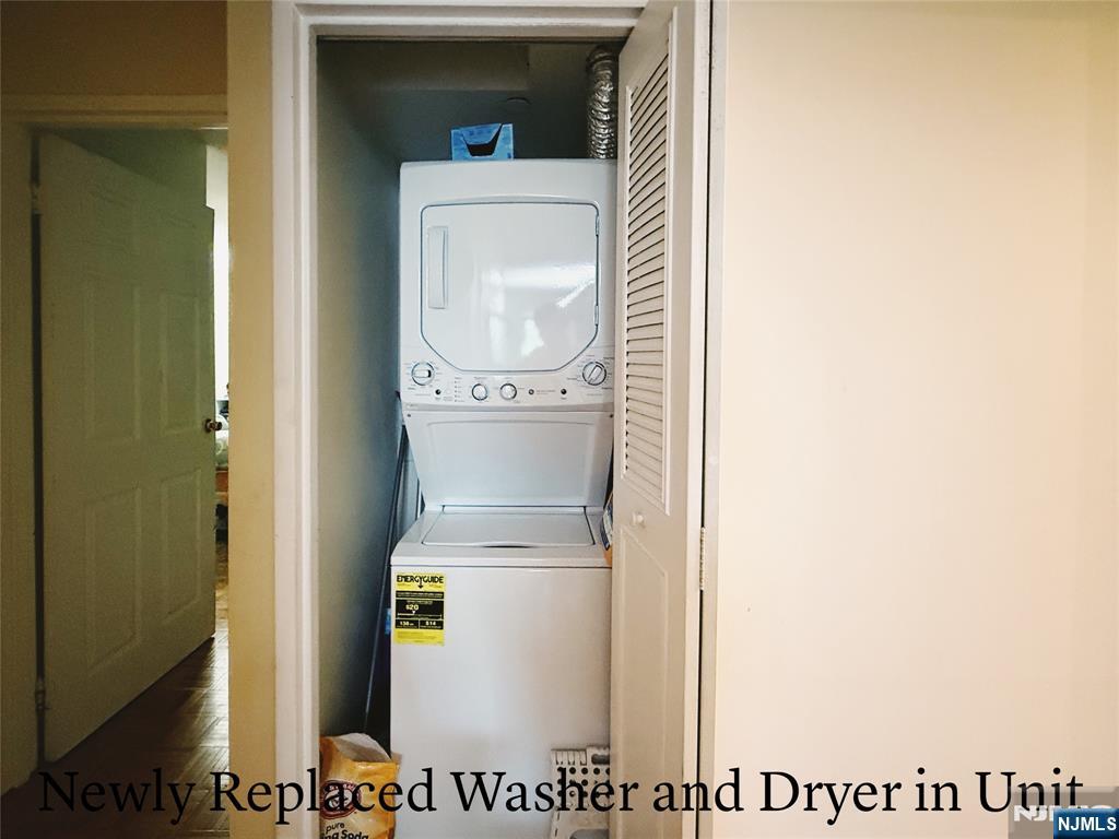 1265 15th Street, Unit 1A Fort Lee, NJ 07024 - Photo 12 of 14 a utility room with dryer and washer