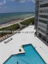a white bath tub sitting in a bathroom
