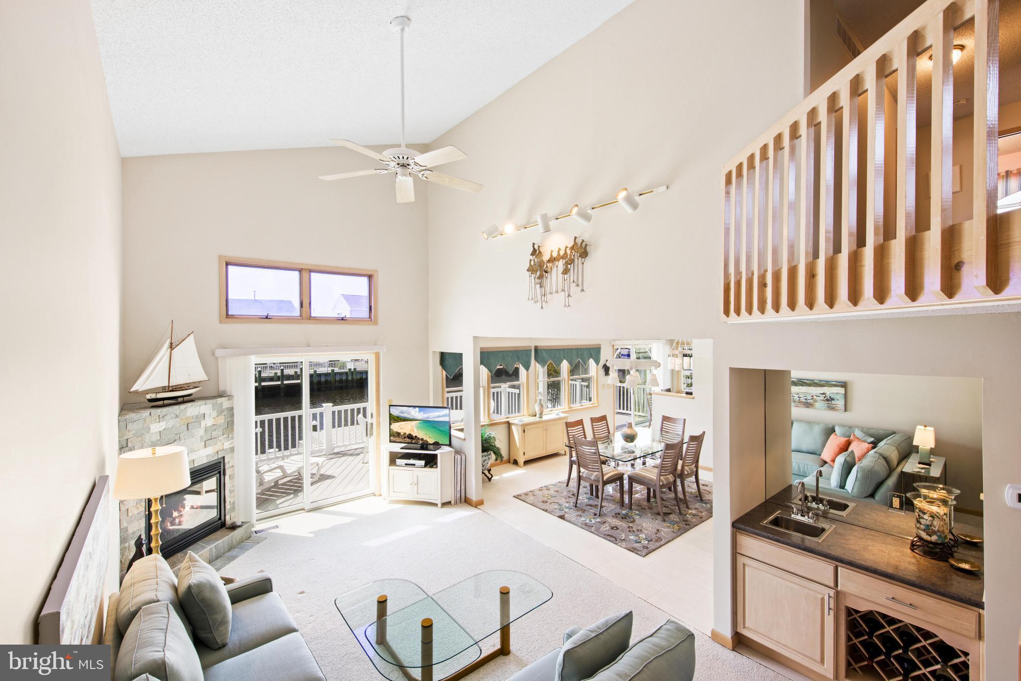 164 Peter Road Manahawkin, NJ 08050 - Photo 6 of 54 a living room with patio furniture and a window