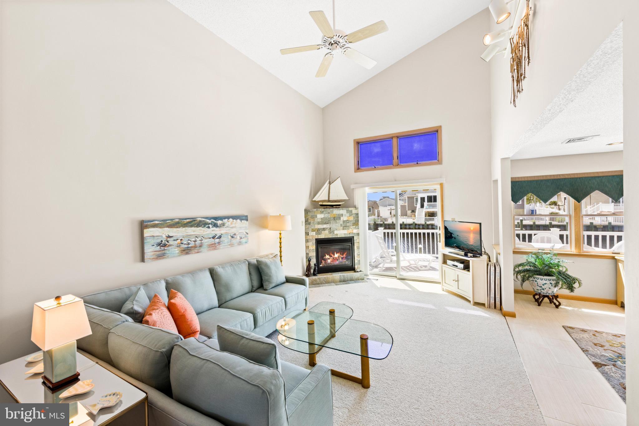 164 Peter Road Manahawkin, NJ 08050 - Photo 7 of 54 a living room with furniture and a fireplace
