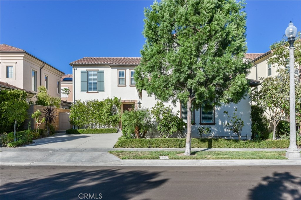 67 Elmdale Irvine, CA 92620 - Photo 2 of 39 a house view with a garden space