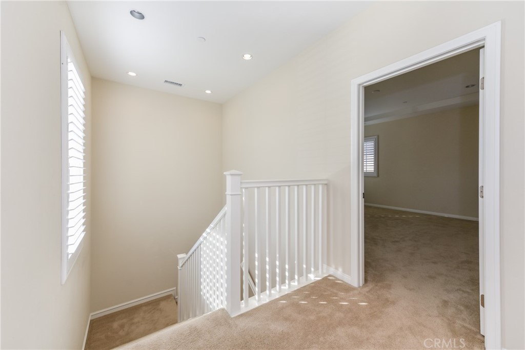 67 Elmdale Irvine, CA 92620 - Photo 25 of 39 a view of a hallway and entryway