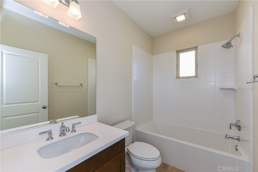 67 Elmdale Irvine, CA 92620 - Photo 29 of 39 a bathroom with a sink toilet and shower
