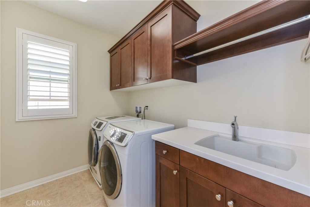 67 Elmdale Irvine, CA 92620 - Photo 31 of 39 a utility room with dryer and washer