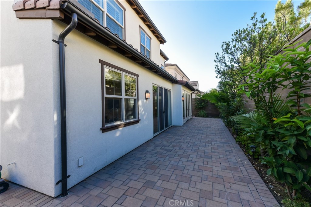 67 Elmdale Irvine, CA 92620 - Photo 34 of 39 a view of a house with backyard and garden