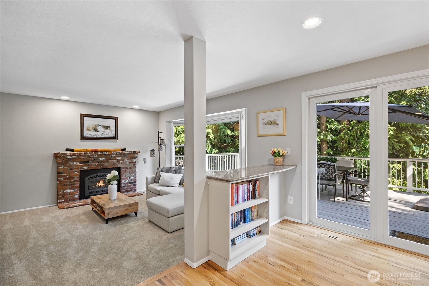 4310 209th Avenue Northeast Sammamish, WA 98074 - Photo 14 of 39 a bed room with a bed and a book shelf