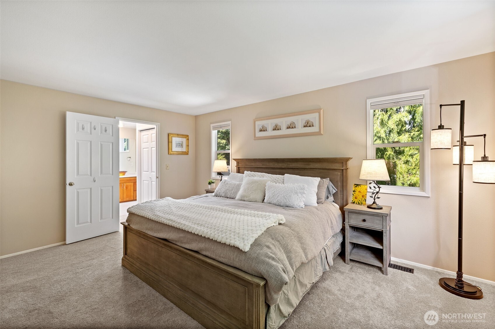 4310 209th Avenue Northeast Sammamish, WA 98074 - Photo 24 of 39 a bedroom with a bed and a window