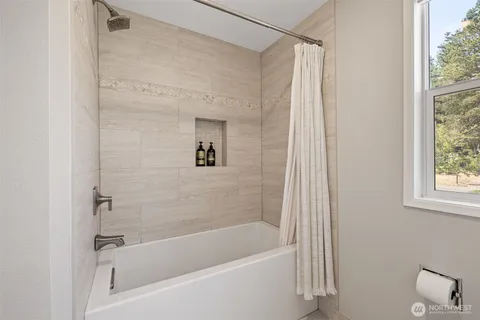 a view of a table and chairs on the roof deck