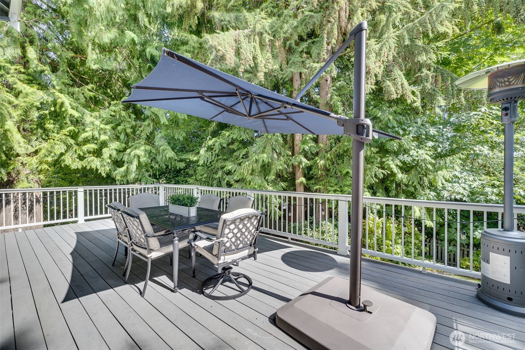 4310 209th Avenue Northeast Sammamish, WA 98074 - Photo 34 of 39 a view of a table and chairs on the roof deck