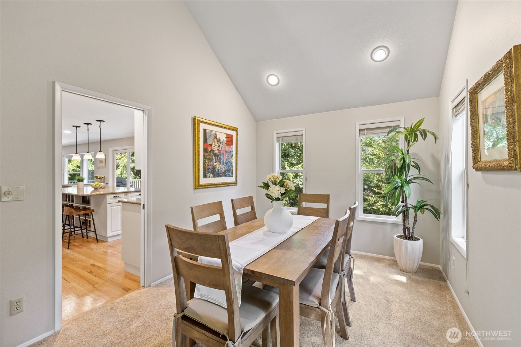 4310 209th Avenue Northeast Sammamish, WA 98074 - Photo 7 of 39 a view of a dining room with furniture window and wooden floor