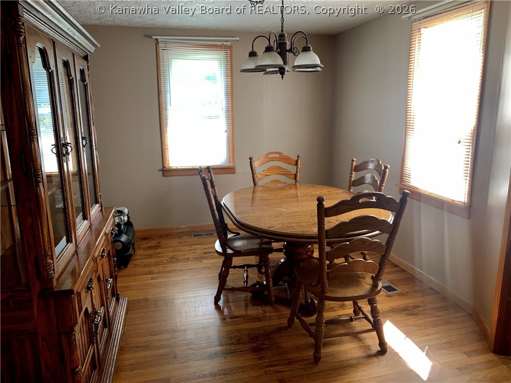 5497 Jerrys Run Road Apple Grove, WV 25502 - Photo 7 of 21 Dining room with wood floors