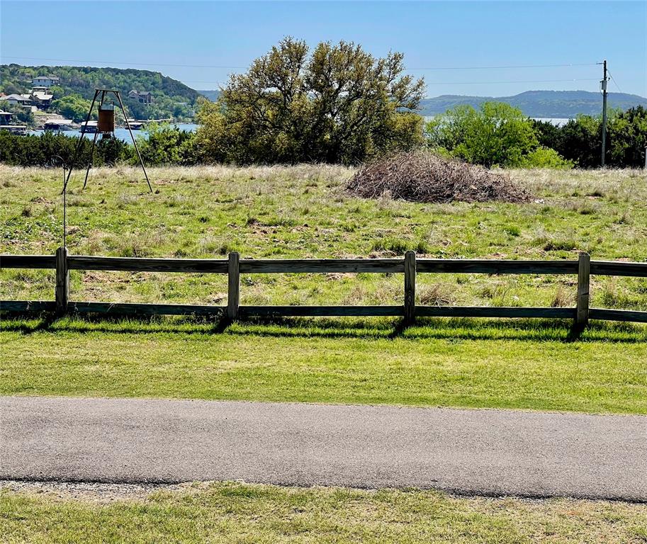 2334 San Bar Road, Unit 96 Graford, TX 76449 - Photo 39 of 40 The "deer meadow" at Golden Cove is directly across from lot #96, and the lake views beyond it are beautiful!