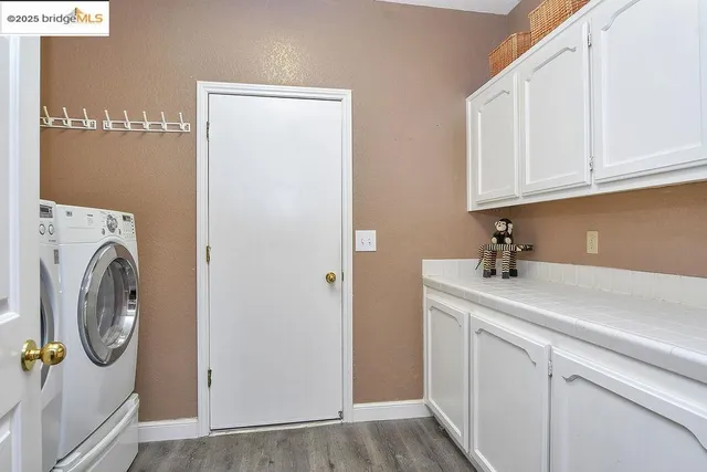 a view of a livingroom with workspace and a couch