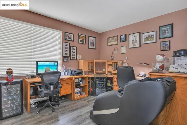 a bathroom with a granite countertop toilet and a shower