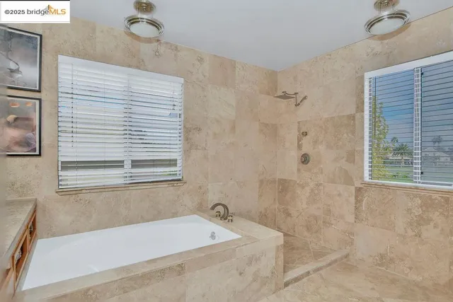 a view of balcony with wooden floor