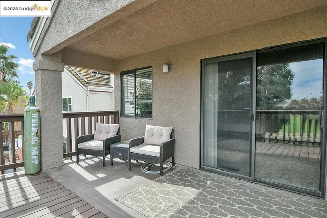 a view of an ocean with a building in the background