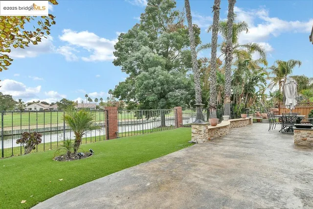 a view of a lake with a big yard