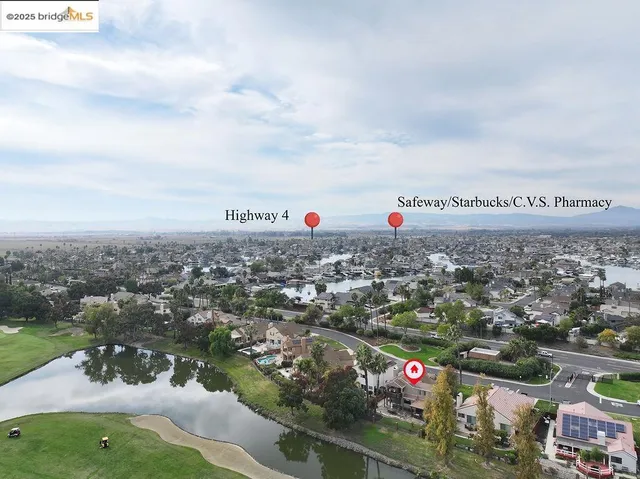 a view of a lake with a garden