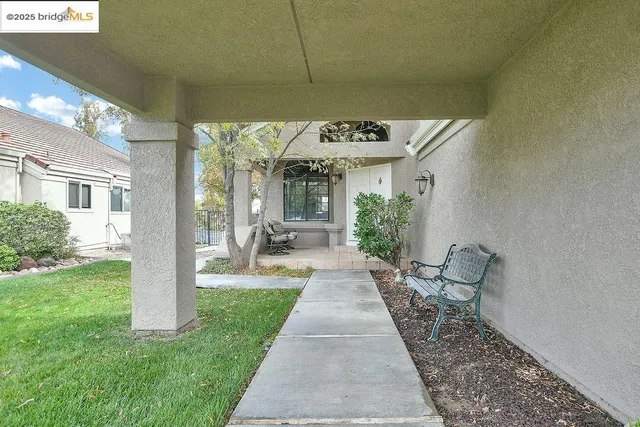 a building outdoor space with patio furniture