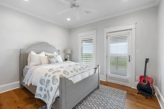 a bed room with a bed and a window