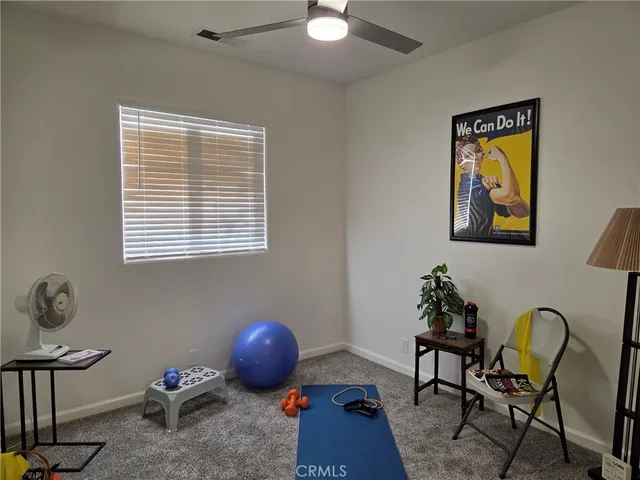 a room with furniture and window