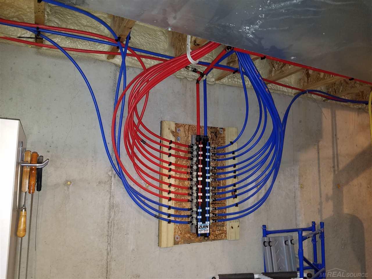 47866 Gloede Road Macomb, MI 48044 - Photo 38 of 42 The entire water supply system is manifold controlled.