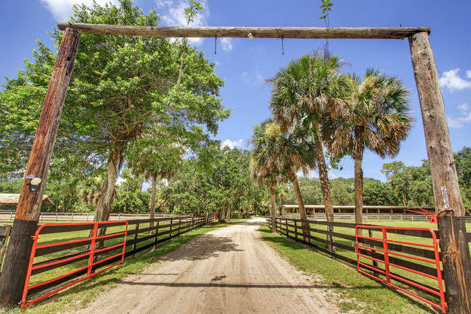 2833 F Road Loxahatchee Groves, FL 33470 - Photo 1 of 6 2833 F Rd entrance