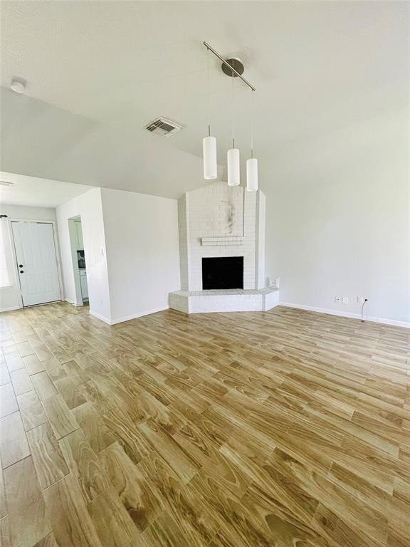 17002 Dew Drop Lane Houston, TX 77095 - Photo 4 of 14 a view of empty room with wooden floor
