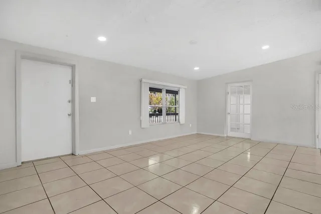 a view of an empty room and window